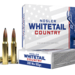 Box of Nosler Whitetail Country .308 Winchester 165-grain soft-base soft-point (SB-SP) hunting cartridges — 20 rounds, brass casings with visible product label.