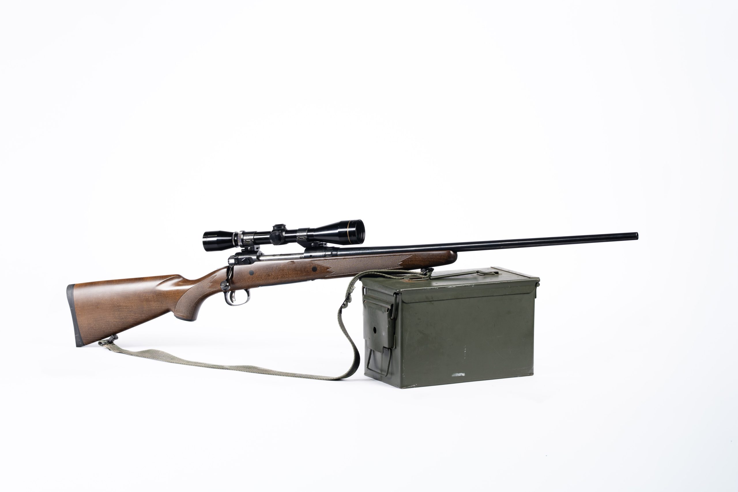 Used Savage Model 111 7mm Remington Magnum bolt-action hunting rifle with classic Leupold 3-9x scope in excellent condition